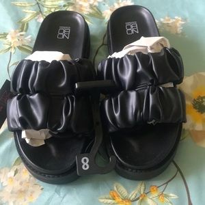 Woman’s size 8 NoBo NoBoundaries black platform slide sandals.